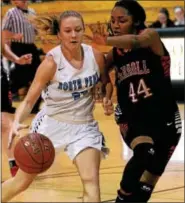  ?? BOB RAINES — DIGITAL FIRST MEDIA ?? North Penn’s Alli Lindsay tries to push past Carroll’s Harlem Jennings Tuesday night.