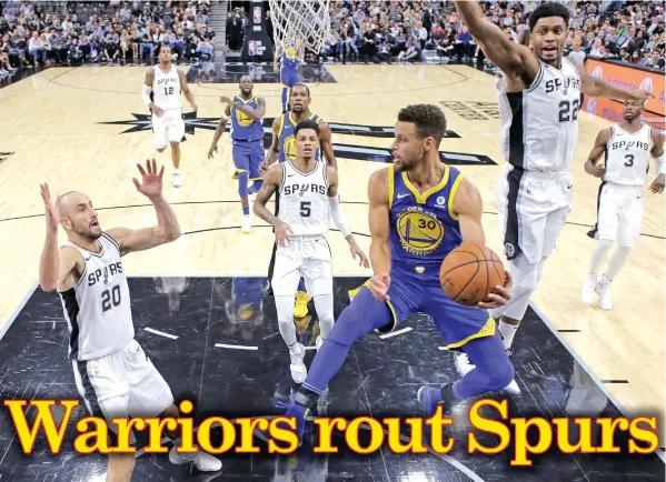  ?? ASSOCIATED PRESS ?? Golden State Warriors guard Stephen Curry (30) drives to the basket against the San Antonio Spurs during the first half of an NBA basketball game in San Antonio.