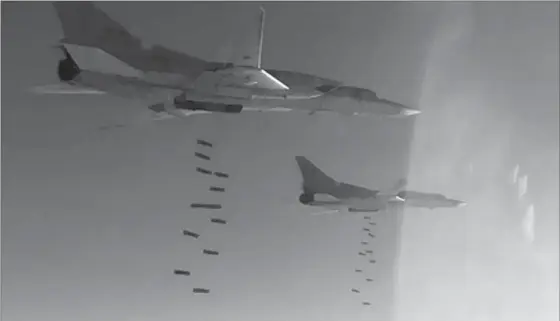  ?? THE ASSOCIATED PRESS ?? In this photo provided, by the Russian Defense Ministry Press Service, Russian air force Tu-22M3 bombers strike Islamic State targets in Syria in January of this year.