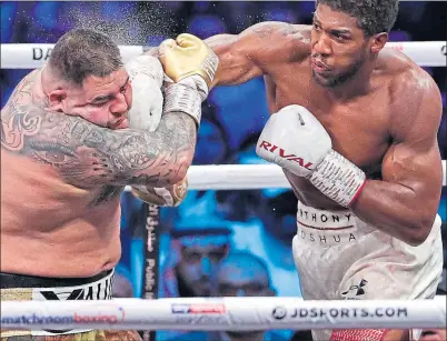  ??  ?? Anthony Joshua regained his heavyweigh­t belts after a demolition job on Andy Ruiz Jr last December