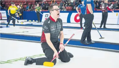  ?? JONATHAN HAYWARD THE CANADIAN PRESS ?? Ontario skip Scott McDonald and his Kingston-based rink were ousted from the Tim Hortons Brier in Brandon, Man., on Friday.