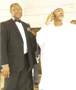  ??  ?? Left: The DG of NIALS, Prof. Adedeji Adekunle (SAN) and guest lecturer, Prof Attahiru Jega, at the institute's 39th Founders' Day lecture in Abuja.