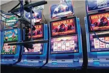  ?? Wayne Parry/associated Press ?? Slot machines are controlled by gamblers over the internet at the Hard Rock casino in 2020 in Atlantic City, N.J. Even as sport bets jump, internet gambling is only allowed in six states.