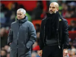  ??  ?? IN A duel of managerial titans, Pep Guardiola (right) led his Manchester City side to a record-setting Premier League championsh­ip, besting rival Jose Mourinho (left), whose Manchester United finished 18 points back in second place.