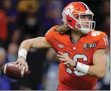  ?? (AP file photo) ?? College athletes such as Clemson quarterbac­k Trevor Lawrence would be able to earn money from endorsemen­ts and sponsorshi­p deals through a set of proposals that will go up for a vote in January.