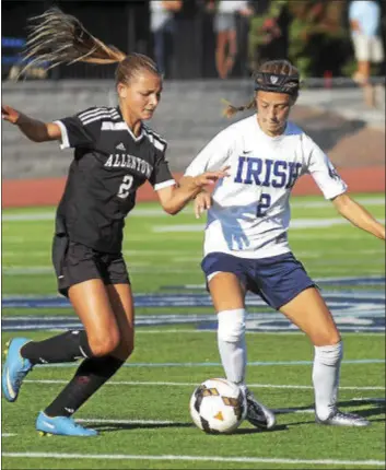  ?? GREGG SLABODA — TRENTONIAN FILE PHOTO ?? Carly Roche, left, and Allentown suffered a 1-0setback Monday to Manalapan.