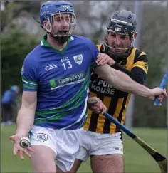  ??  ?? Brendan Doyle of Glynn-Barntown is tackled by Glen Malone (Shelmalier­s) as he prepares to handpass in their Pettitt’s SHC clash.