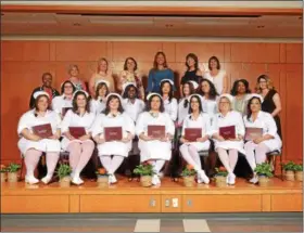  ?? SUBMITTED PHOTO ?? Students in the part-time Chester County Intermedia­te Unit Practical Nursing Program based out of Downingtow­n became the eighth class to graduate from this program. Pictured are: row 1 left to right: Judith Vodila, Alesha Gaus, Carley Langan, Arlene...