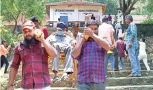  ?? LEJU KAMAL ?? A voter being carried out of the polling station on a dolly at Vettipram, near Pathanamth­itta, on Friday.