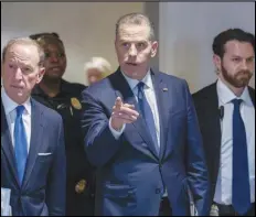  ?? ASSOCIATED PRESS ?? Hunter Biden, son of President Joe Biden, with attorney Abbe Lowell, left, leaves after a closed-door deposition in the Republican-led investigat­ion into the Biden family, on Feb. 28 on Capitol Hill in Washington.