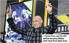  ??  ?? > Tyson Fury says he will defeat Deontay Wilder after their first-fight draw