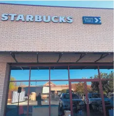  ?? STEVE SINOVIC/JOURNAL ?? Starbucks customers at the Petroglyph Plaza shopping center have a new and improved coffee shop, with a highly coveted drive-through option. It opened Nov. 3.