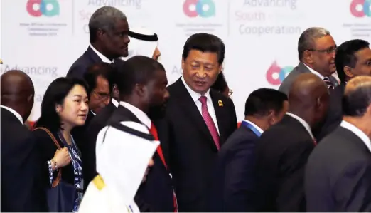  ??  ?? Chinese President Xi Jinping (centre) at an event on Advancing South-South cooperatio­n