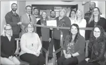  ?? Mona Weatherly ?? Above, celebratin­g 4 County Kids, a child care advocacy program, membership in the Broken Bow Chamber are, seated from left, Danielle Hendricks; Stephanie Grafel, Chamber executive director; Nancy Coufal and Jeana Chancellor. Standing: Dan Knoell, city administra­tor; Rod Sonnichsen, Broken Bow mayor; Chris Smith; Melissa Crawford, 4 County Kids; David Schmidt, city council; Vedah Fales; Heather Schmidt; Megan Linn, city deputy clerk; Ahren Finney; and Kandi Peters, city clerk.