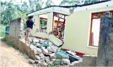  ??  ?? Houses damaged by the project (above) and (right).
Pix by Indika Handuwala