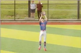  ?? Photo by Becky Polaski ?? Dutch right fielder Tysen Beimel is shown about to make the catch for the final out in Monday’s D9-AAAA championsh­ip game between St. Marys and Clearfield.