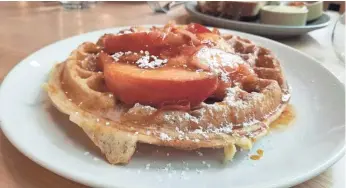  ?? EIGHT ROW ?? If you’re visiting Seattle, make sure to try Sourdough Waffles With Fruit from the chef’s farm.