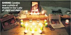  ??  ?? SHRINE Candles near a photo of Maddie in Our Lady of Light last night