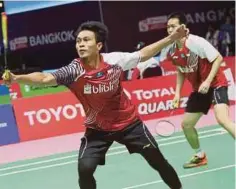  ??  ?? PEMAIN beregu lelaki Indonesia, Mohamad Ahsan bersama Hendra Setiawan.