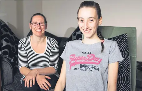  ?? Picture: Mhairi Edwards. ?? Brave Amber with mum Cherise who is backing calls for scoliosis screening in schools.