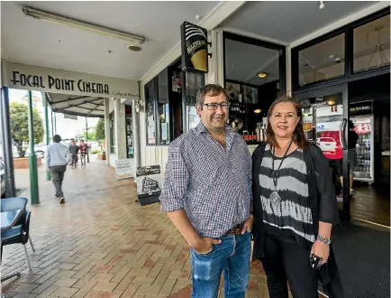  ?? PHOTO: DAVID UNWIN/STUFF ?? In a tumultuous industry, boutique cinema Focal Point has made it to 10 years. Owners Matt and Julie Bell outside the Feilding cinema.