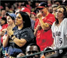  ?? Brett Coomer / Staff photograph­er ?? Fans watch Astros right fielder Kyle Tucker bat during the sixth inning at Minute Maid Park on Wednesday. Nationals fans said they found most Houstonian­s to be welcoming.