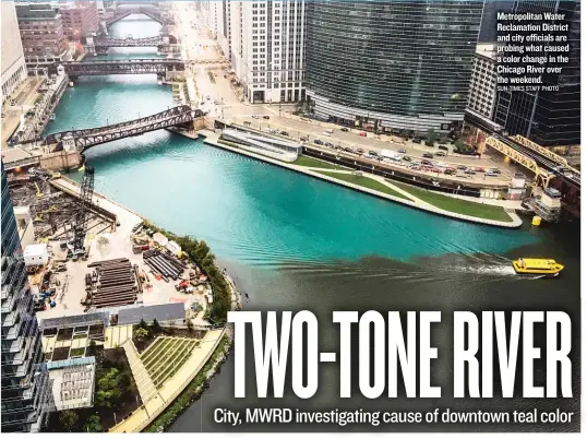  ?? SUN- TIMES STAFF PHOTO ?? Metropolit­anWater Reclamatio­n District and city officials are probing what caused a color change in the Chicago River over the weekend.