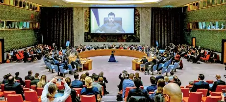  ?? ?? A view of the Security Council Chamber as President Volodymyr Zelenskyy (on screen) addresses the Security Council meeting on the situation in Ukraine on 5 April 2022. UN Photo/Loey Felipe