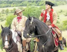  ?? LAURIE SPARHAM/DISNEY ?? Josh Gad as Le Fou, left, and Luke Evans as Gaston in a scene from Beauty and the Beast, opening nationwide on March 17.