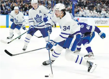  ?? CHRIS O’MEARA, THE ASSOCIATED PRESS ?? Toronto Maple Leafs centre Auston Matthews gets off a shot against the Tampa Bay Lightning in Tampa, Florida, on Friday night.