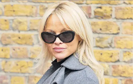  ?? GRANT POLLARD/INVISION/AP ?? “‘Humane fur’ is like ‘merciful murder’: It doesn’t exist,” says Pamela Anderson, who is urging Prada to end its use of fur.