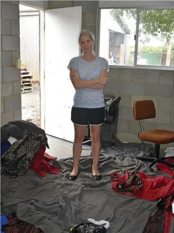  ?? Photo: Marguerite Cuddihy ?? CRIME SPREE: Maranoa Laundry’s Aileen Prior in the toilet block, where juvenile offenders allegedly spent two hours ransacking the property.