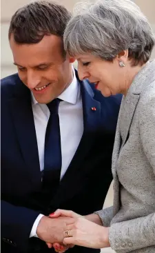  ??  ?? Crucial talks: Mr Macron and Mrs May in Paris in June