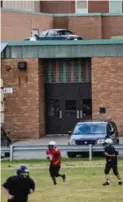  ?? BARRY GRAY/THE HAMILTON SPECTATOR ?? STEP 5: The conspirato­rs used a pulley system they learned to build in physics class to pull the car up onto the roof.