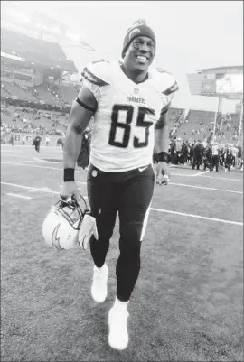  ?? John Grieshop Getty Images ?? ANTONIO GATES celebrates a playoff win at Cincinnati in January. The All-Pro tight end, starting his 12th season in San Diego, had doted on his little sister Pam.