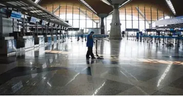  ??  ?? Covid-19 hit: The almost deserted KL Internatio­nal Airport in the middle of the coronaviru­s pandemic. — Bernama