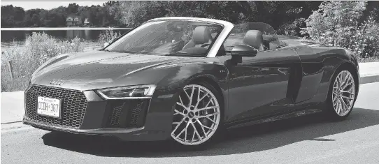  ?? CHRIS BALCERAK/DRIVING ?? The 2017 Audi R8 Spyder is powered by a 5.2-litre V-10 engine that creates 540 horsepower and can accelerate from 0 to 100 km/h in 3.6 seconds.