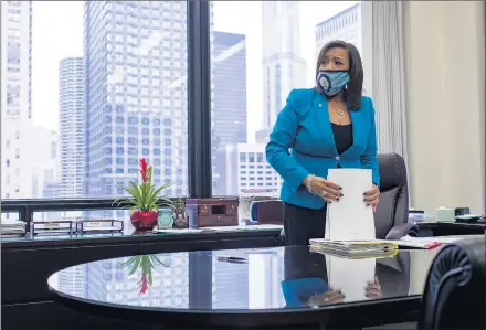  ?? BRIAN CASSELLA/CHICAGO TRIBUNE ?? New Cook County Circuit Court Clerk Iris Martinez worksWedne­sday in her Daley Center office. Martinez was elected to the post in November.