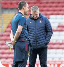  ??  ?? Villa coach John Terry with manager Dean Smith