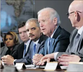  ?? SUSAN WALSH/ ASSOCIATED PRESS ?? U.S. Vice-President Joe Biden, centre, speaks during a meeting with victims’ groups and gun safety organizati­ons in Washington Wednesday.