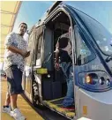  ?? Billy Calzada/Staff file photo ?? Passengers board a VIA Primo bus in 2014. An increase in local funding has opened the door to federal grants to boost public transporta­tion here.