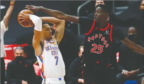  ?? — USA TODAY SPORTS ?? Raptors forward Chris Boucher (right) defends Oklahoma City Thunder forward Darius Bazley last night.