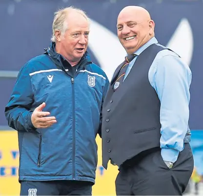  ?? SNS. Picture: ?? Dundee assistant Jimmy Nicholl chats with Arbroath boss Dick Campbell at Dens on Saturday.