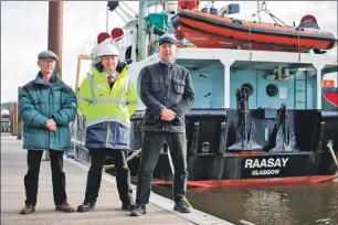  ??  ?? Gordon Law, left, and Stuart Craig of the Clyde River Steamer Club joined CalMac’s small vessel technical superinten­dent Jonathan Davies for a last look around the vessel.