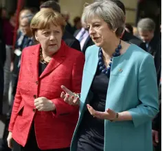  ??  ?? TALKS: British Prime Minister Theresa May speaks with German Chancellor Angela Merkel at a recent EU summit in Malta