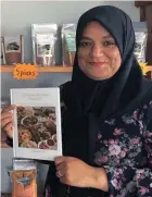 ??  ?? TOP COOK: Salwaa Francis Smith with her book