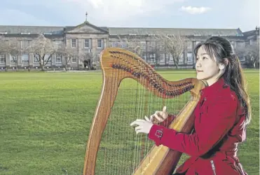  ?? PICTURE: NEIL HANNA ?? The festival’s youngest performer, Phoenix, in the grounds of George Watson’s College