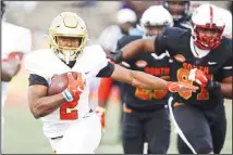  ?? (AP) ?? North running back Joshua Kelley of UCLA (2) carries the ball during the second half of the Senior Bowl college football game on Jan 25 in Mobile,
Alabama.