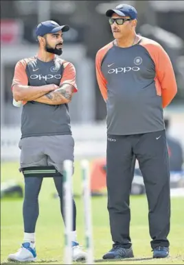  ?? GETTY ?? Ravi Shastri (right) will be the only Indian coach in charge at the upcoming World Cup.