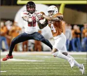  ?? STEPHEN SPILLMAN / FOR AMERICAN-STATESMAN ?? Texas safety DeShon Elliott intercepte­d six passes this season and returned two of them for touchdowns.